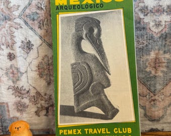 May include: A vintage travel brochure titled ARCHAEOLOGICAL MEXICO ARQUEOLOGICO with a green border and a black and white illustration of a bird-like stone carving. The text PEMEX TRAVEL CLUB AVE. JUAREZ N 89 MEXICO 1, D. F. is printed below.