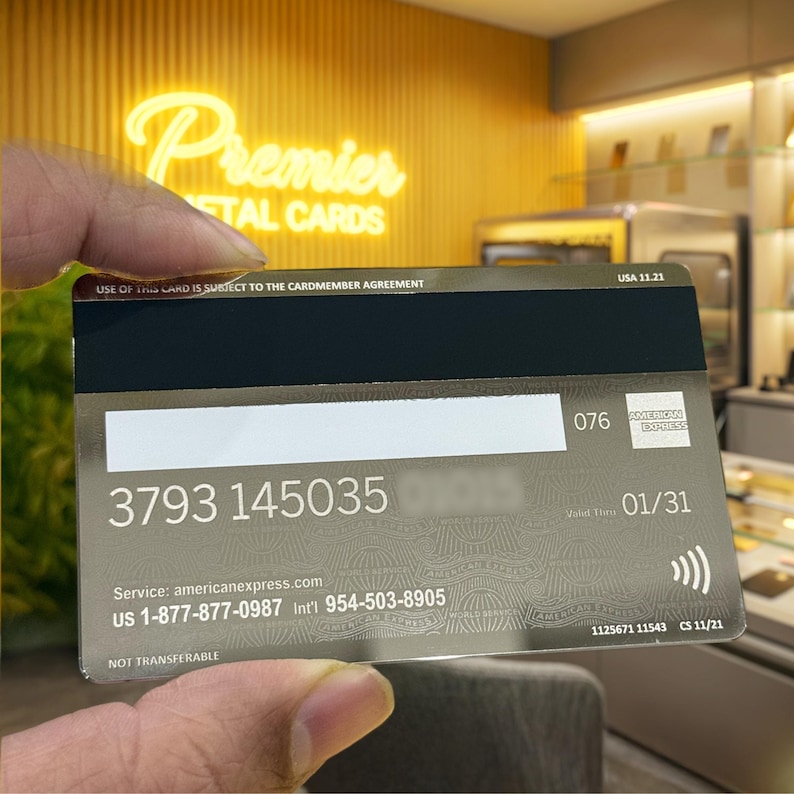 Premium mirror Amex style metal card featuring polished reflective surface, engraved personalization, sleek metallic texture, and sophisticated luxury craftsmanship designed for an elite look.