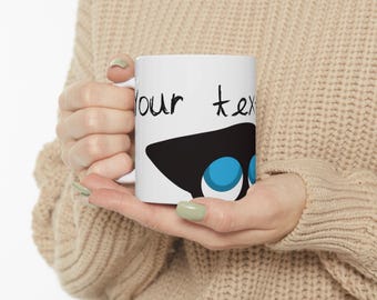 青い目の猫の顔の陶器マグカップ | 手描き風アート、光沢のある白いコーヒーカップ