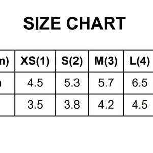 May include: A size chart with the title "SIZE CHART" in bold black text. The chart shows measurements in centimeters for length and width, ranging from XS to XL. Length measurements range from 4.5 cm to 7.2 cm.