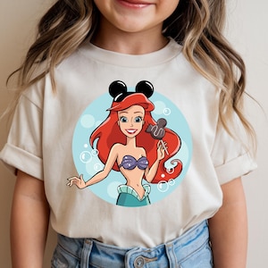 May include: A rustic wooden sign with the text "Welcome to our home" in white lettering. The sign features a distressed finish and a simple, inviting design, perfect for a front porch or entryway.