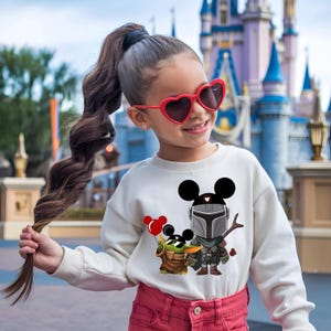 May include: A set of three ceramic mugs with a speckled, matte finish. The mugs are in shades of cream, light gray, and dark gray. Each mug has a simple, minimalist design, perfect for coffee or tea.