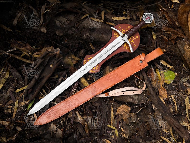 These iconic words engraved on the blade define this historic sword replica. The creed of the Knights Templar - Nothing for us, Lord, nothing for us but for the glory of thy name - marked their illustrious and sometimes infamous 200-year military influence. This magnificent sword named The Accolade would have been a sword worthy of the Grand Master to knight a loyal member into this holy order.