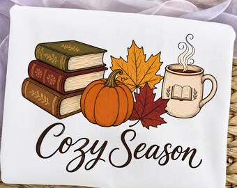 PNG de temporada acogedora, ilustración de calabaza y café para amantes de los libros de otoño, arte de sublimación de temporada de calabazas, diseño de ropa acogedora de otoño, archivo de descarga digital