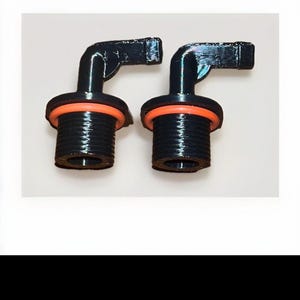 May include: A set of three ceramic mugs with a speckled, matte finish. The mugs are in shades of cream, light gray, and dark gray. Each mug has a simple, minimalist design and a rounded handle. The mugs are suitable for coffee or tea.