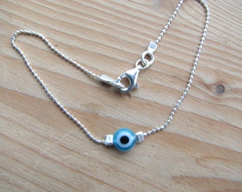 Boze oog armband Sterling zilveren kleine gevoelige hemelsblauw kraal