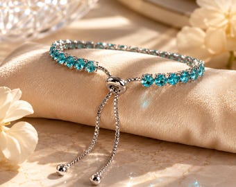 Adjustable White Gold Tennis Bracelet with Ocean-Blue Gemstones