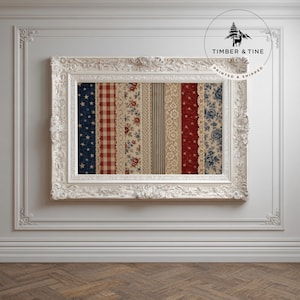 May include: A framed artwork featuring a collage of patterned fabrics in a white ornate frame. The fabrics include a navy blue star pattern, red gingham, floral prints, stripes, and lace. The frame is mounted on a white wall.