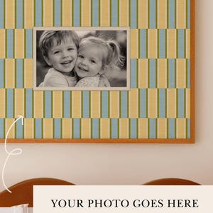 May include: A framed print with a black and white photo, featuring a repeating pattern of vertical stripes in yellow, blue, and green. The frame is made of light-colored wood. The text "PRINT IT TODAY!" is visible.