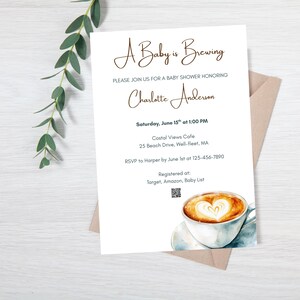 May include: A baby shower invitation with the text "A Baby is Brewing" in elegant script. The invitation includes details for the event, such as the date, time, and location, and features a watercolor illustration of a coffee cup with a heart-shaped design.
