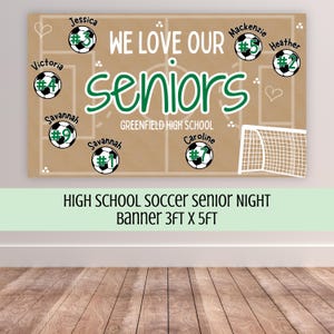 May include: A 3ft x 5ft rectangular banner with a tan background featuring a soccer field diagram, a white soccer goal, and the text WE LOVE OUR seniors GREENFIELD HIGH SCHOOL. It includes seven soccer ball graphics with names and jersey numbers.