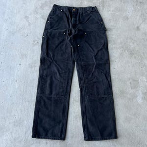 Pantalones de carpintero de trabajo Carhartt negros con doble rodilla imagen 1