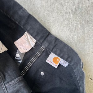 Pantalones de carpintero de trabajo Carhartt de color negro descolorido con doble rodilla imagen 6