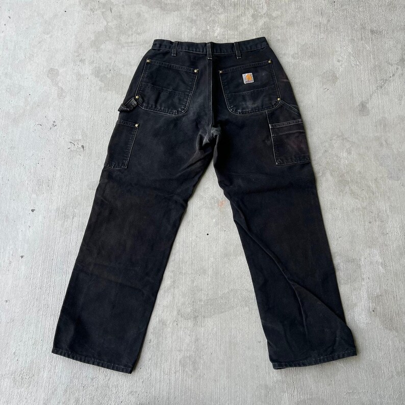Pantalones de carpintero de trabajo Carhartt de color negro descolorido con doble rodilla imagen 4