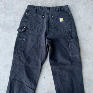 Pantalones de carpintero de trabajo Carhartt negros con doble rodilla imagen 6