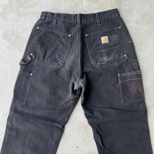Pantalones de carpintero de trabajo Carhartt de color negro descolorido con doble rodilla imagen 5