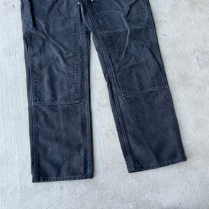 Pantalones de carpintero de trabajo Carhartt negros con doble rodilla imagen 3