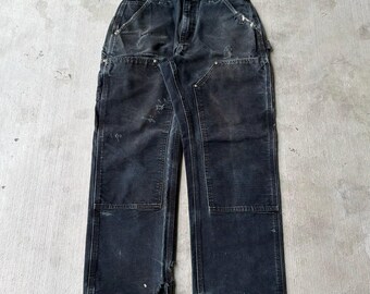 Pantalones de carpintero de trabajo Carhartt de color negro descolorido con doble rodilla