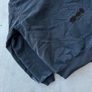 Chaqueta de trabajo con capucha negra Carhartt J140, talla grande imagen 7