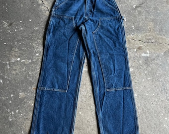 Calça jeans Carhartt azul, modelo carpinteiro, com reforço nos joelhos, tamanho 28x31.