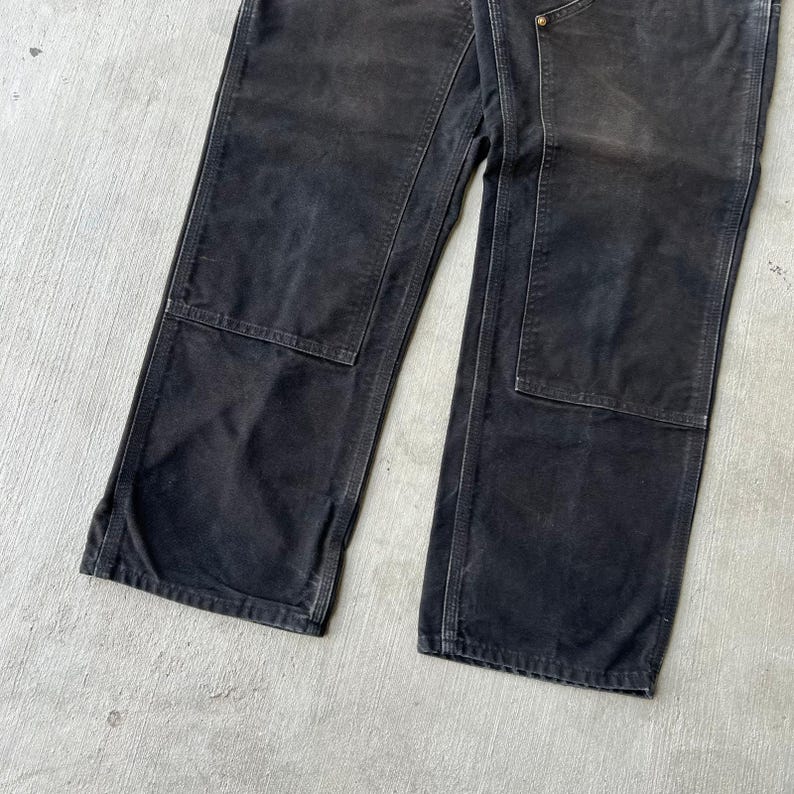 Pantalones de carpintero de trabajo Carhartt de color negro descolorido con doble rodilla imagen 3