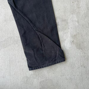 Pantalones de carpintero de trabajo Carhartt de color negro descolorido con doble rodilla imagen 7