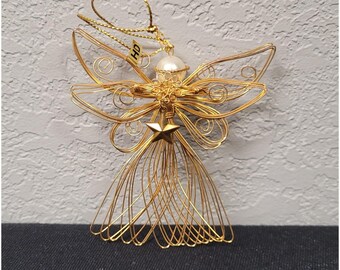 1997 Avon Radiant Angel Christmas Tree Ornament Gold Tone Wire