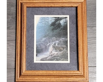 Wolves by Waterfall Framed Print 13 x 11 inches