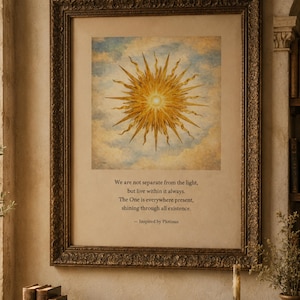 May include: Framed artwork featuring a radiant sunburst design against a cloudy sky. The artwork is in a decorative, ornate brown frame. Text below the image reads: "We are not separate from the light..." Inspired by Plotinus.