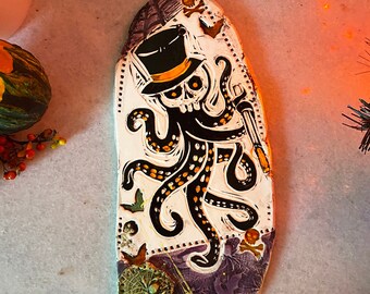Skull in top hat with tenticles, spiderweb and bats wall art with purple  - made by Liz Dearth Artifact Pottery Ohio