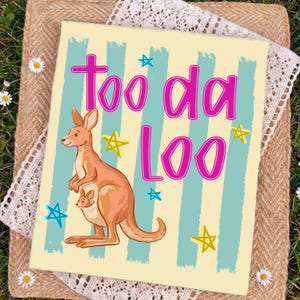 May include: A rectangular print featuring a kangaroo with a joey in its pouch. The print has a light yellow background with teal vertical stripes and pink text that reads "Too da Loo". Blue and yellow stars are scattered around the kangaroo.