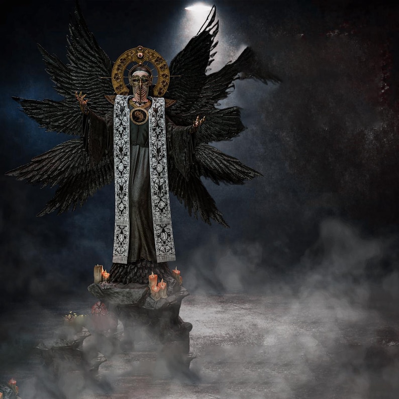 May include: A dark, multi-winged figure wearing a long black robe with a white, intricately patterned stole. The figure has a golden halo behind its head, a mask covering its face, and stands atop a stone pedestal surrounded by small lit candles.