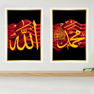 May include: Two framed art prints with black backgrounds. One features the word "Allah" in gold calligraphy over a red wavy design. The other print displays gold calligraphy over a red wavy design.