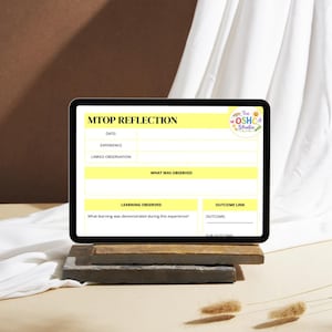 May include: A black tablet displaying a "MTOP REFLECTION" form with yellow highlighted sections. The form includes fields for date, experience, and linked observation. The OSHC Studio logo is in the top right corner. The tablet rests on a stack of wooden blocks.