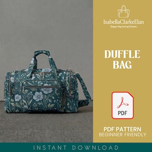 Può includere: Un borsone con sfondo verde acqua scuro e un motivo floreale bianco e verde chiaro. La borsa è dotata di due manici superiori, una tasca frontale con cerniera, scomparti laterali con cerniera e una tracolla. Il testo include IsabellaClarkeElan.