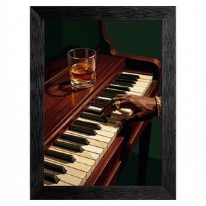 May include: Framed art print of a piano with a glass of amber liquid on the wood surface. A hand with a gold ring and bracelet plays the piano. The piano keys are black and white.
