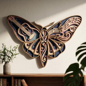 May include: A multi-layered wooden wall art piece shaped like a butterfly. The left wing features an acoustic guitar silhouette, while the right wing displays musical notes and staff lines. The design uses natural wood tones and deep blue accents.