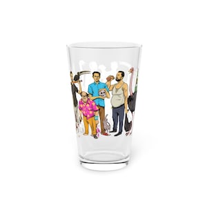 May include: A clear glass pint featuring a cartoon illustration of several characters. The characters are depicted in various poses, holding objects like a skull, a bird, and a sandwich. The design is colorful and detailed, with a white background.