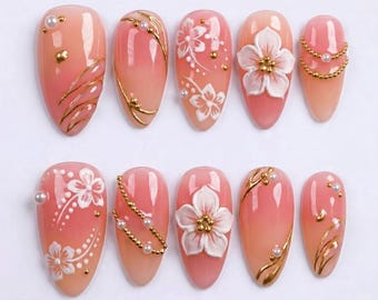 Uñas postizas 3D asimétricas con diseño de flor de cerezo, perlas y cadena dorada / Uñas falsas en forma de almendra / Uñas de boda de lujo con efecto degradado rosa rubor