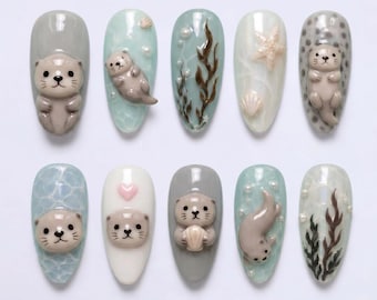 Uñas postizas 3D de nutria marina desiguales con lindos diseños de conchas y estrellas de mar / Uñas falsas en forma de almendra / Uñas Kawaii Coquetas con efecto de ondas de agua de mar