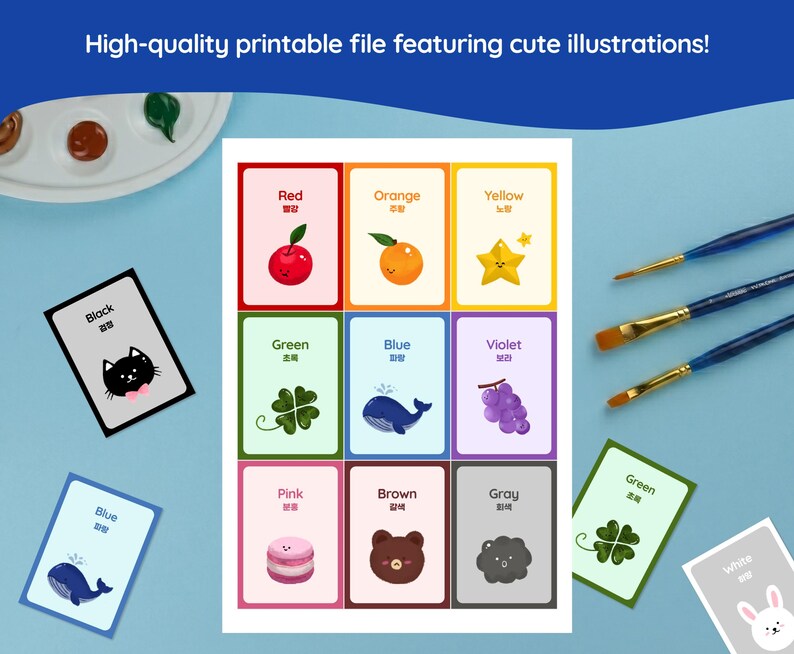 May include: A printable file featuring colorful illustrations of colors and objects. The cards include the colors red, orange, yellow, green, blue, violet, pink, brown, and gray. The text "High-quality printable file featuring cute illustrations!" is at the top.