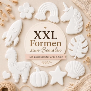 May include: A collection of white, matte-finish plaster shapes for painting, including a rocket, rainbow, unicorn, flower, llama, pumpkin, star, seashell, and leaf, surrounding a central circular sign with the text XXL Formen zum Bemalen.