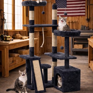 May include: A multi-level cat tree with multiple platforms, a cubby, and scratching posts. Several cats are on the cat tree, with an American flag in the background. The cat tree is dark blue with beige and tan accents.