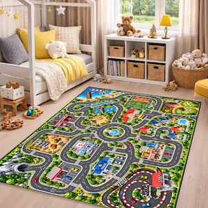 May include: A rectangular area rug featuring a colorful printed city map design with winding roads, a police station, a hospital, a construction site, a race track, and various buildings, all set against a green landscape with trees.