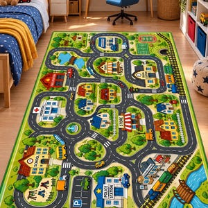 May include: A rectangular area rug featuring a colorful city map design with roads, a train track, and various buildings labeled as hospital, fire station, school, police station, store, cafe, and train station, set against a green landscape.