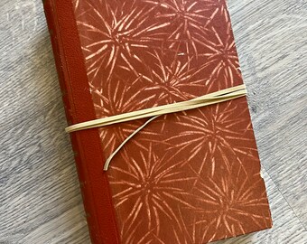 Upcycled sketchbook made using a  vintage book cover