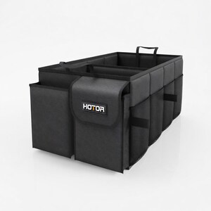 May include: Black car trunk organizer with multiple compartments and pockets. The organizer has a handle for easy carrying and the word "HOTOR" is printed on the front.