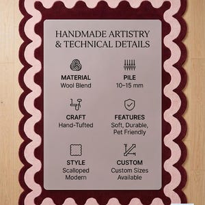 May include: A rectangular rug with a scalloped edge in dark burgundy and light pink. The center features text: HANDMADE ARTISTRY & TECHNICAL DETAILS, listing Material: Wool Blend, Pile: 10-15 mm, Craft: Hand-Tufted, Features: Soft, Durable, Pet Friendly.
