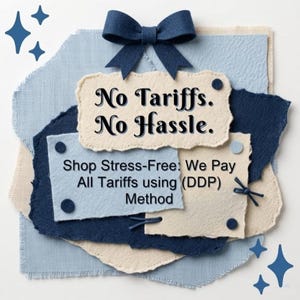 May include: A layered arrangement of textured paper scraps in shades of navy blue and cream, topped with a dark blue felt bow. The text reads: No Tariffs. No Hassle. Shop Stress-Free: We Pay All Tariffs using (DDP) Method. Four blue star icons are present.