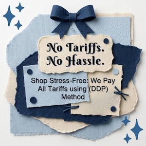 May include: A layered arrangement of textured paper scraps in shades of navy blue and cream, topped with a dark blue felt bow. The text reads: No Tariffs. No Hassle. Shop Stress-Free: We Pay All Tariffs using (DDP) Method. Four blue star icons are present.